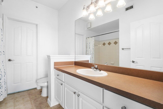 bathroom with tile patterned floors, vanity, toilet, and a shower with shower curtain