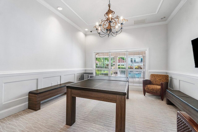 playroom with a chandelier and crown molding