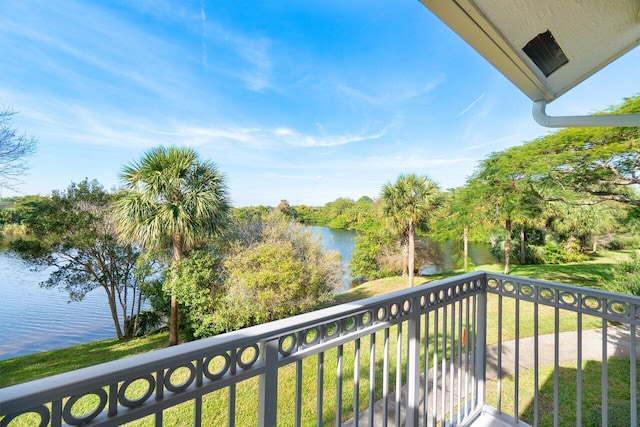 balcony featuring a water view