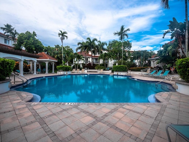 view of swimming pool featuring a patio