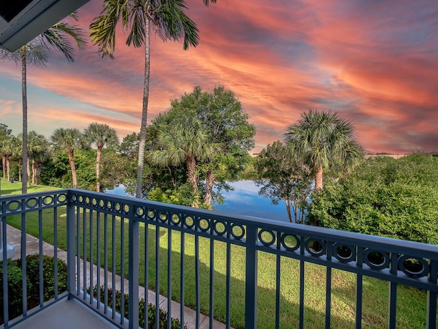 view of balcony at dusk