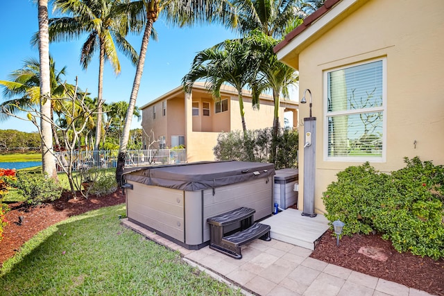 view of patio / terrace featuring a hot tub