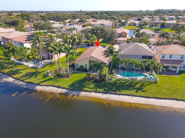 bird's eye view with a water view