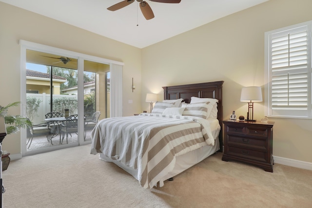 bedroom with access to outside, ceiling fan, and light colored carpet