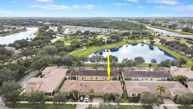 aerial view with a water view and a residential view