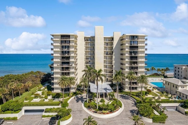 view of building exterior with a water view