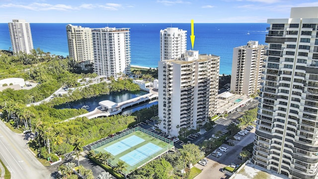 aerial view featuring a water view and a city view