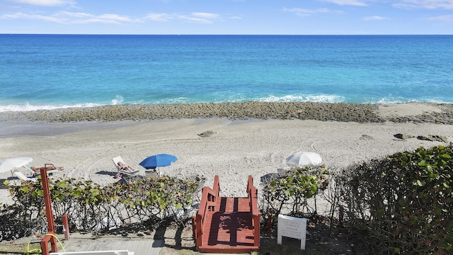 property view of water with a beach view