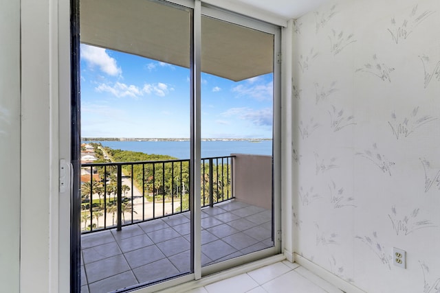 balcony featuring a water view