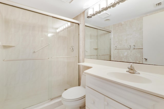 full bath featuring toilet, a stall shower, visible vents, and vanity