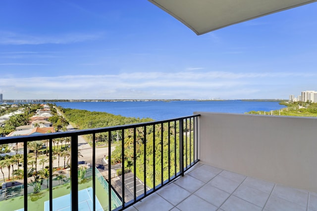 balcony featuring a water view