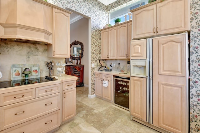 kitchen with wine cooler, paneled refrigerator, ornamental molding, black electric cooktop, and custom range hood