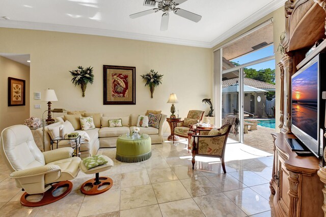 living room with ceiling fan and ornamental molding