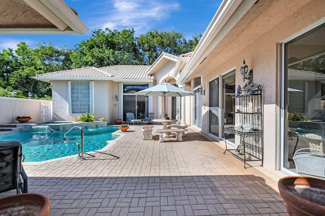 view of pool featuring a patio area