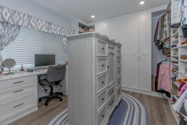 office area with light hardwood / wood-style flooring