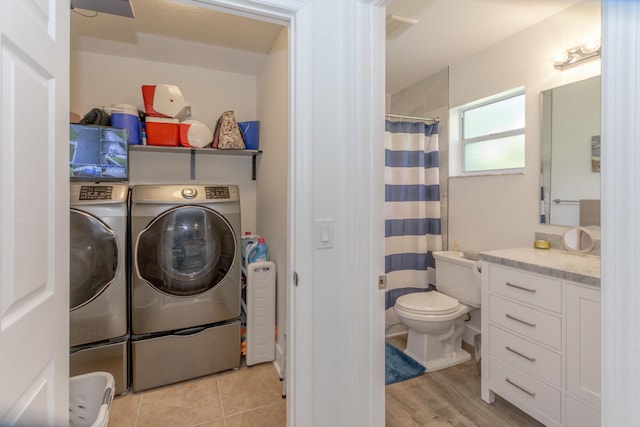 laundry room with washer and dryer