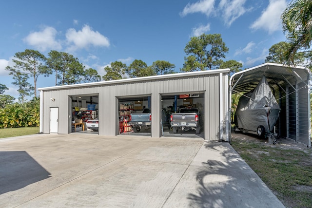 garage featuring a carport