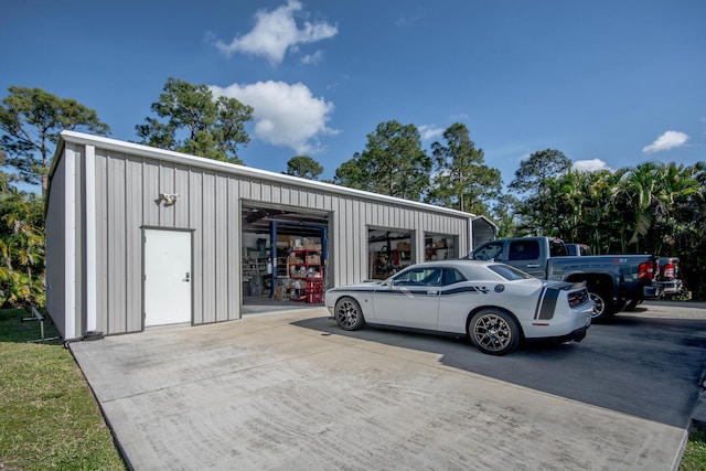 view of outbuilding with a garage