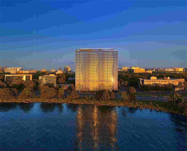 property's view of city with a water view