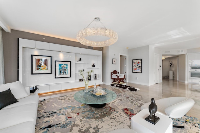 living room featuring an inviting chandelier