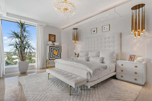 bedroom with a chandelier