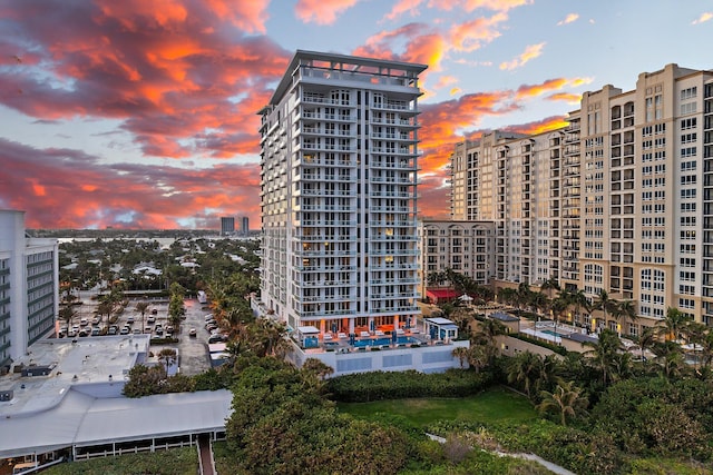 view of outdoor building at dusk