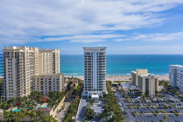 aerial view with a beach view and a water view