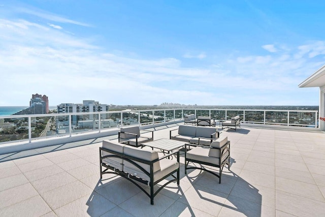 view of patio / terrace featuring an outdoor hangout area and a water view