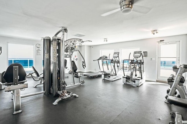 workout area with ceiling fan