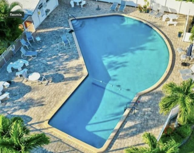 view of pool featuring a patio