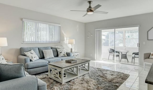 living room featuring ceiling fan