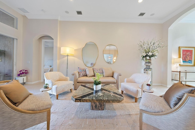 tiled living room featuring crown molding