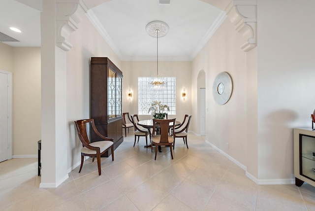 dining room with light tile patterned floors, an inviting chandelier, and crown molding