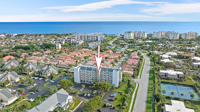 bird's eye view with a water view