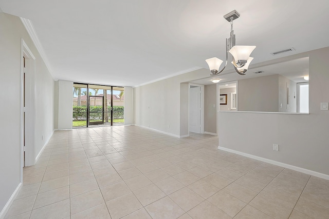 unfurnished room featuring crown molding, light tile patterned floors, visible vents, an inviting chandelier, and baseboards