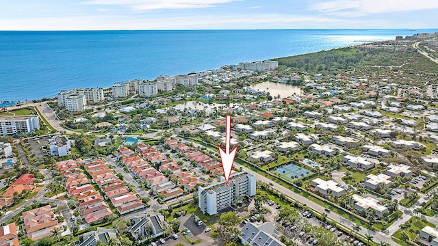 aerial view featuring a water view and a city view