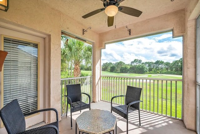 sunroom / solarium with ceiling fan