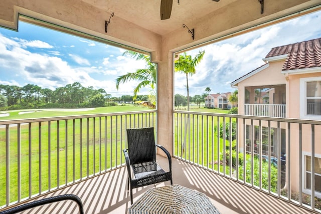 balcony featuring ceiling fan