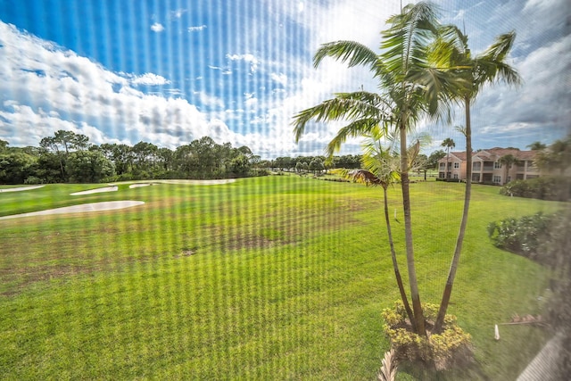 view of community with a yard