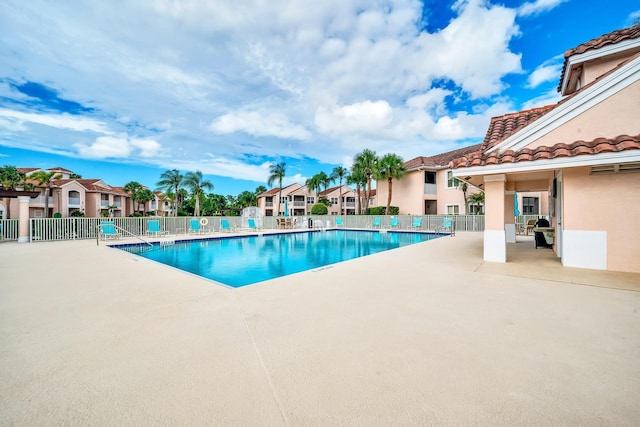 view of pool featuring a patio