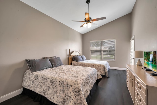 bedroom featuring ceiling fan, dark hardwood / wood-style floors, and lofted ceiling