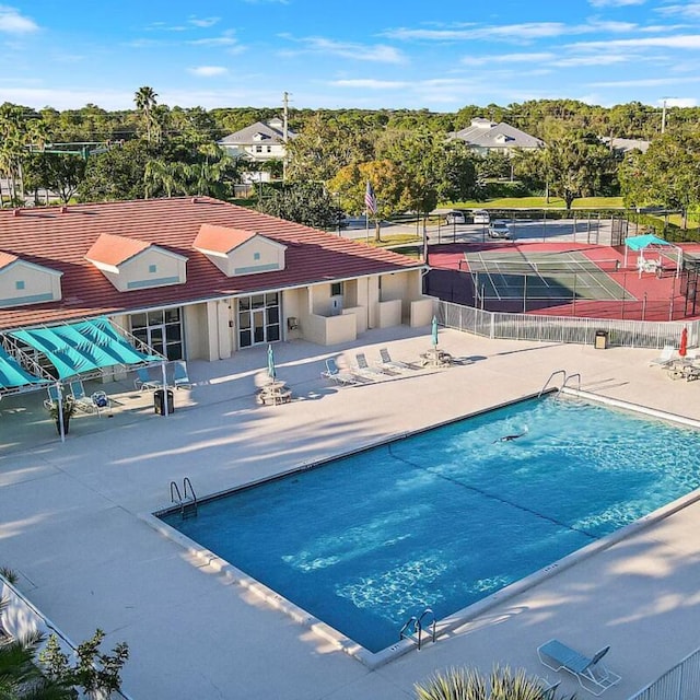 view of pool featuring a patio area