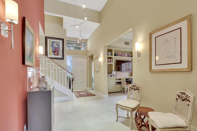 foyer with a high ceiling