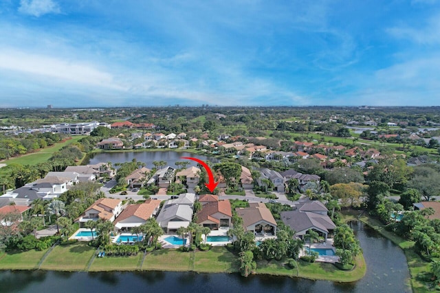 birds eye view of property featuring a water view