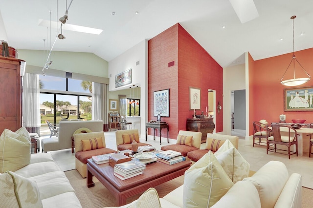 living room featuring high vaulted ceiling