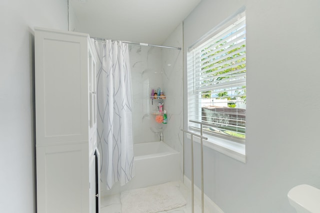 bathroom featuring shower / bath combo