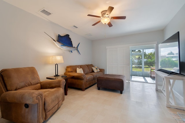 living room featuring ceiling fan