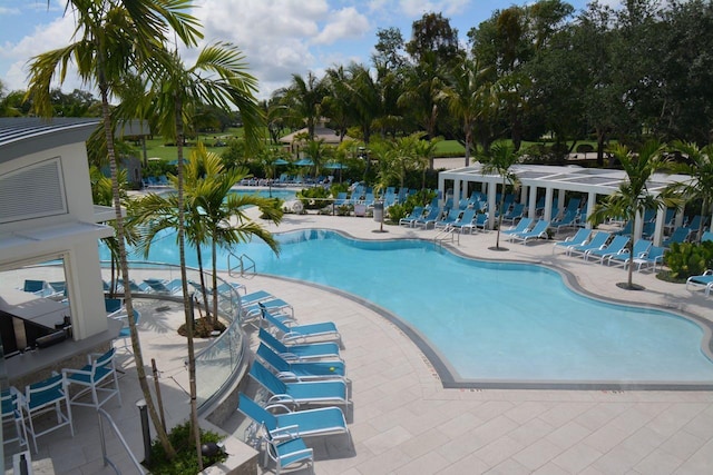 view of swimming pool featuring a patio