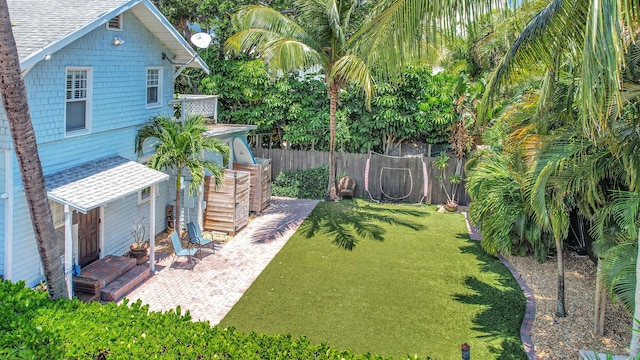 view of yard featuring an outdoor kitchen