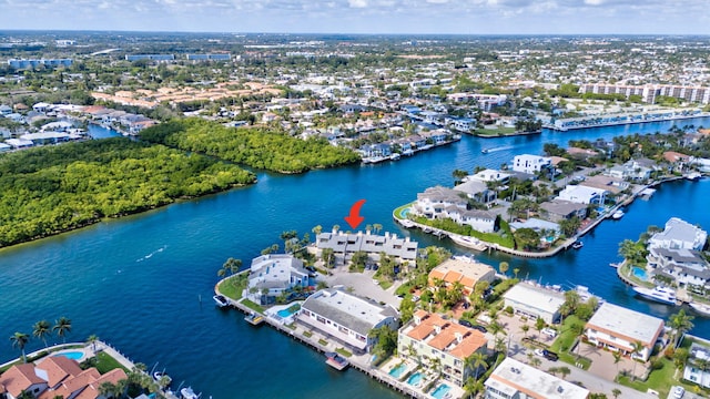 birds eye view of property featuring a water view